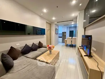 Modern living room with sleek furniture and open layout, perfect for stylish urban living.
