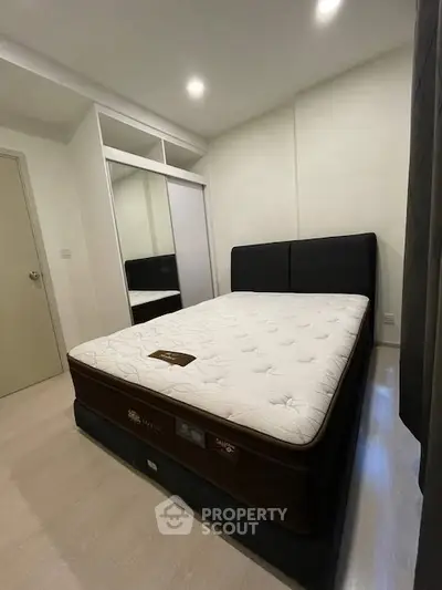 Spacious bedroom with modern design and comfortable mattress