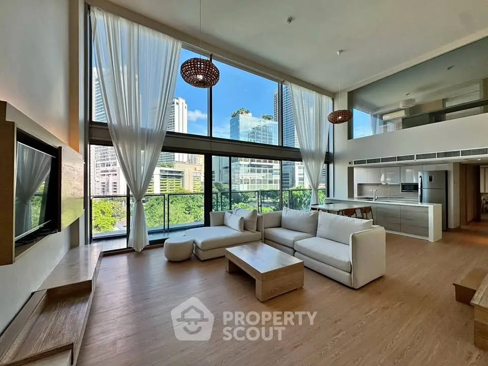 Luxurious modern living room with floor-to-ceiling windows and stunning city view