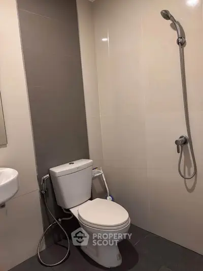 Modern bathroom with shower and toilet in minimalist design