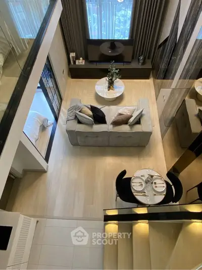 Stunning modern living room with high ceiling and elegant decor