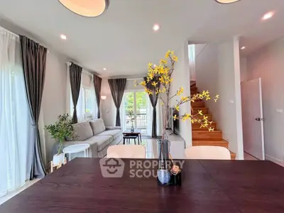 Modern living room with elegant decor and natural light