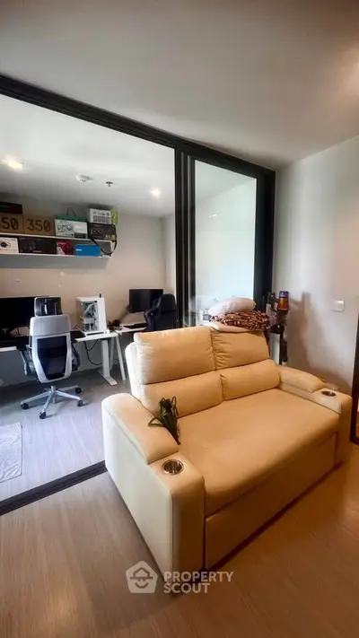 Modern study room with cozy seating and sleek workspace