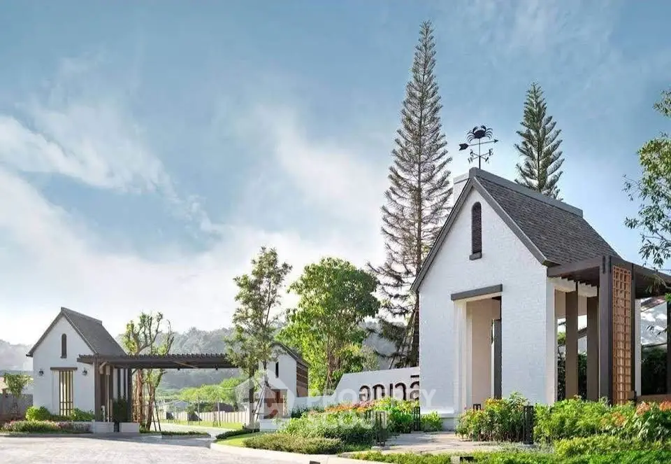 Charming modern residential complex with lush landscaping and mountain views.