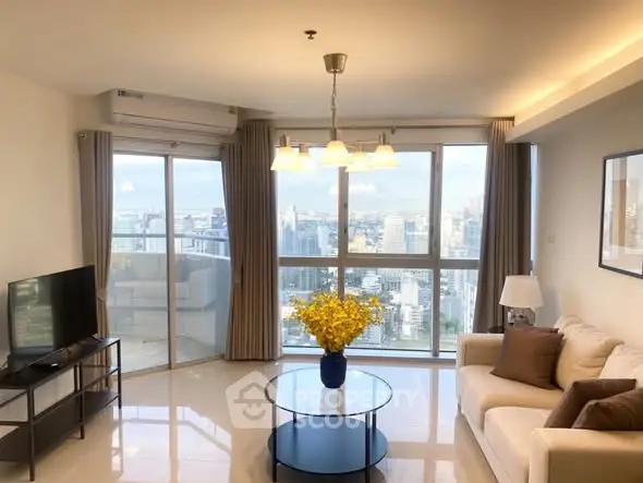 Spacious living room with stunning city view and modern decor