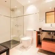 Modern bathroom with glass shower and sleek fixtures