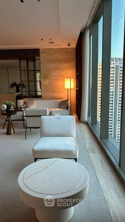 Luxurious living room with floor-to-ceiling windows and city view