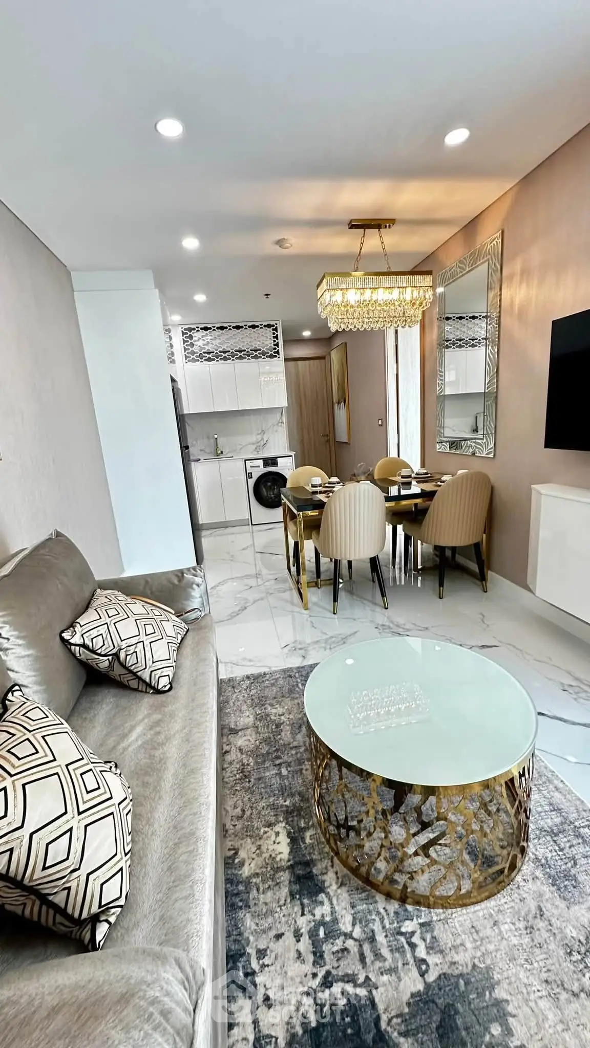 Luxurious modern living room with elegant dining area and stylish kitchen in open layout apartment.