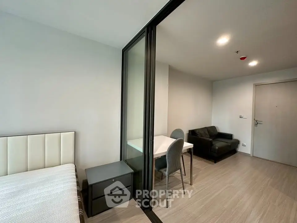 Modern studio apartment with sleek design and cozy living area