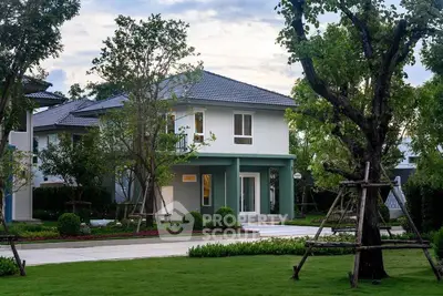 Charming suburban house with lush garden and modern architecture