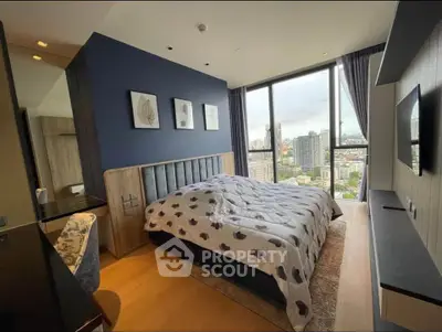Luxurious bedroom with stunning city view and modern decor