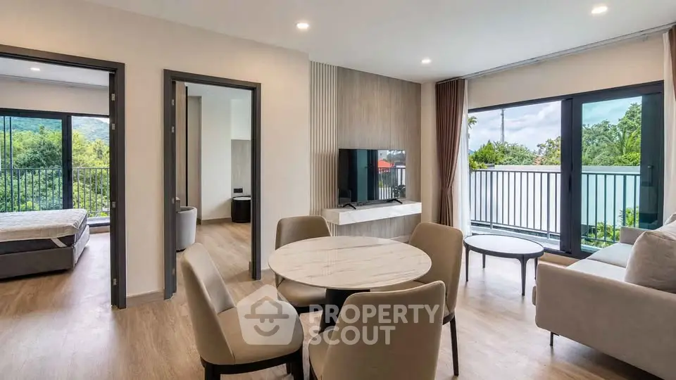 Modern living room with open layout and balcony view