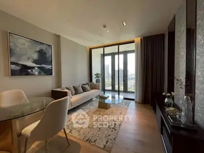 Luxurious living room with modern decor and stunning city view from large windows.