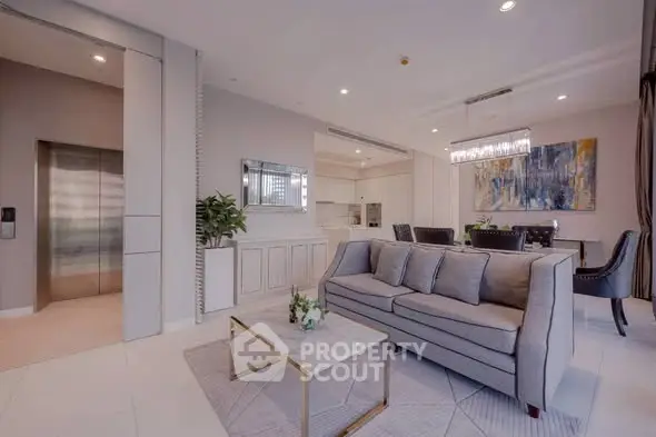 Luxurious open-plan living room with modern kitchen and elegant dining area