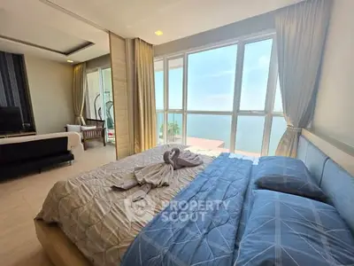 Luxurious bedroom with stunning ocean view and elegant decor