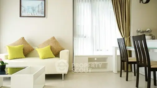 Bright and modern living room with cozy sofa and dining area