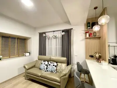 Modern living room with stylish decor and cozy seating area