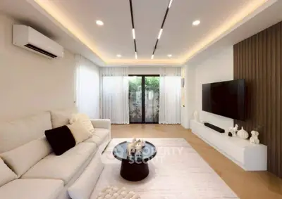 Luxurious modern living room with elegant decor and natural light