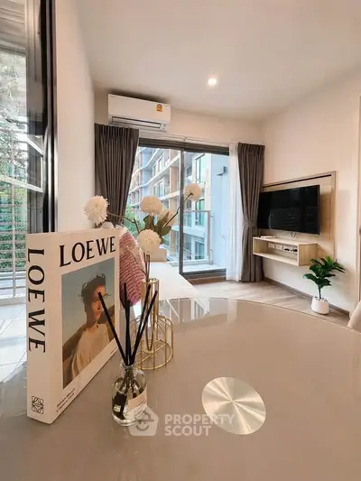 Modern living room with balcony view and stylish decor