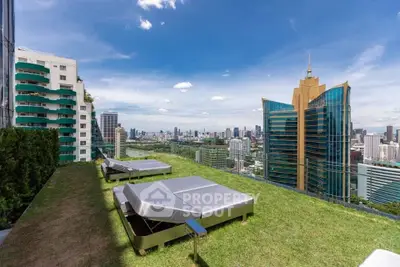Stunning rooftop view with modern lounge chairs overlooking city skyline