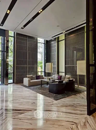 Luxurious modern living room with high ceilings and elegant decor