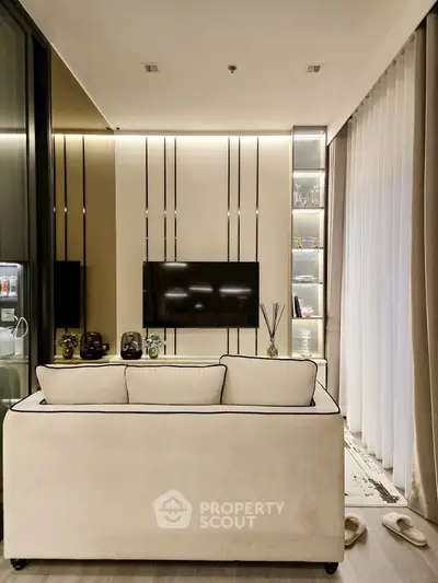 Modern living room with sleek TV setup and elegant decor