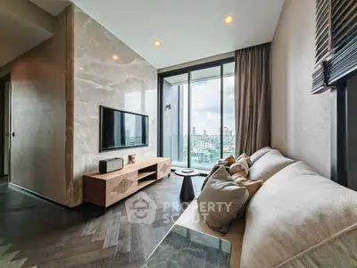 Luxurious living room with modern decor and stunning city view from balcony.