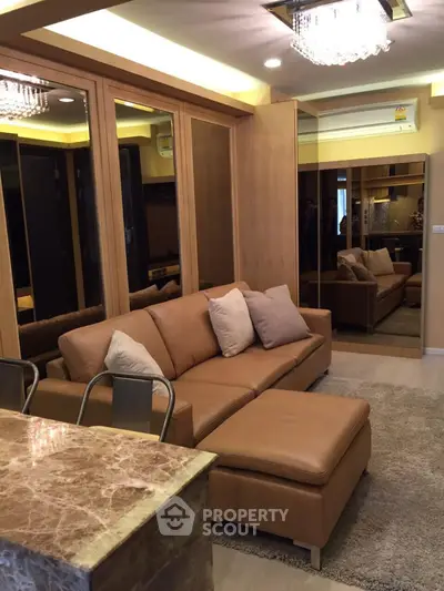 Luxurious living room with elegant leather sofa and marble accents