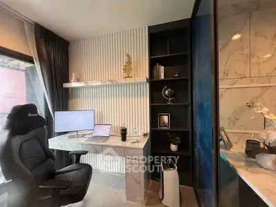 Modern home office with sleek marble desk and ergonomic chair