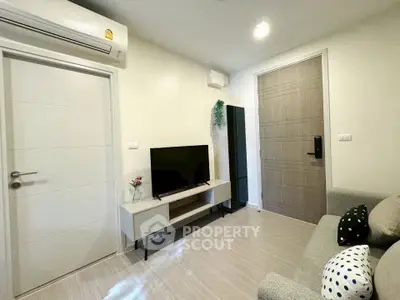 Modern living room with sleek TV setup and stylish decor