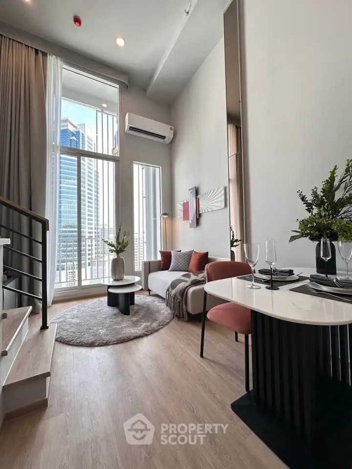 Modern living room with high ceilings and city view in luxury apartment