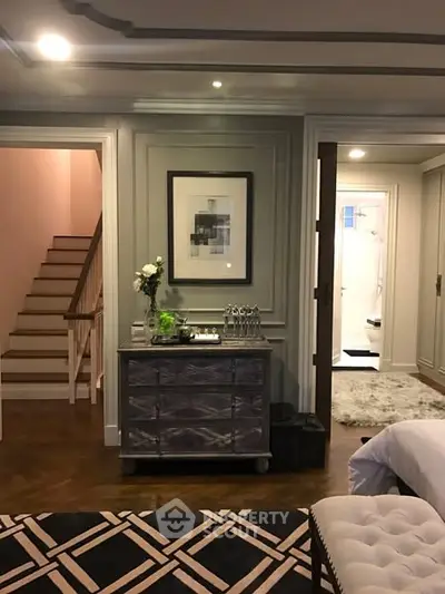 Elegant bedroom with stylish decor and cozy ambiance