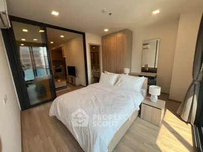 Modern bedroom with elegant decor and ample natural light