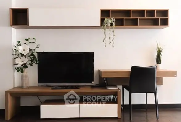 Modern living room with sleek TV unit and stylish decor