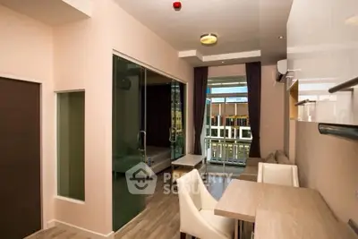 Modern apartment interior with balcony view and stylish furnishings