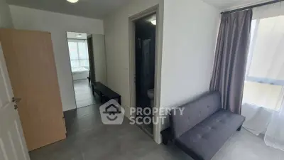 Modern apartment interior with cozy living area and natural light