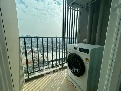 High-rise balcony with washing machine and stunning city view