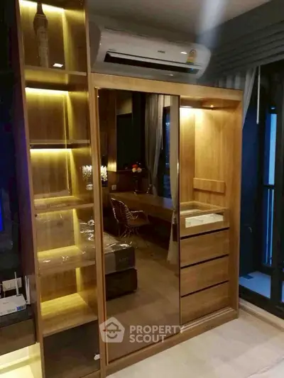 Modern bedroom with stylish wooden wardrobe and ambient lighting