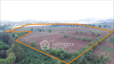 Expansive plot of land with lush greenery and scenic views, ideal for development opportunities.