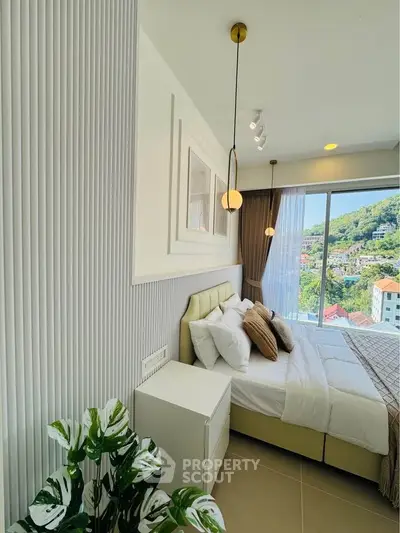 Luxurious bedroom with stunning view and modern decor in high-rise apartment