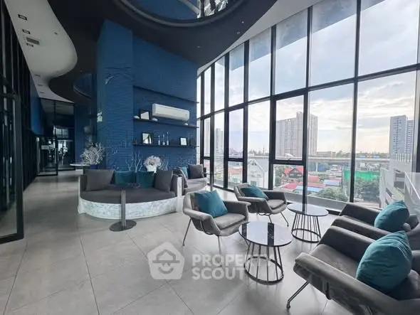 Luxurious modern living room with panoramic city views and elegant decor.