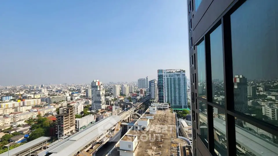 Stunning cityscape view from high-rise building with expansive skyline and modern architecture.