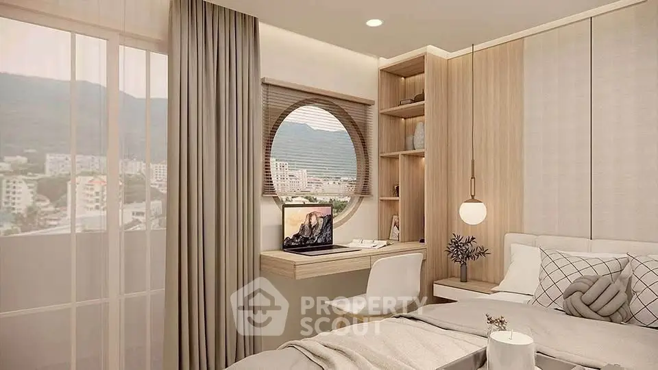 Modern bedroom with a scenic view, featuring a cozy workspace and elegant decor.