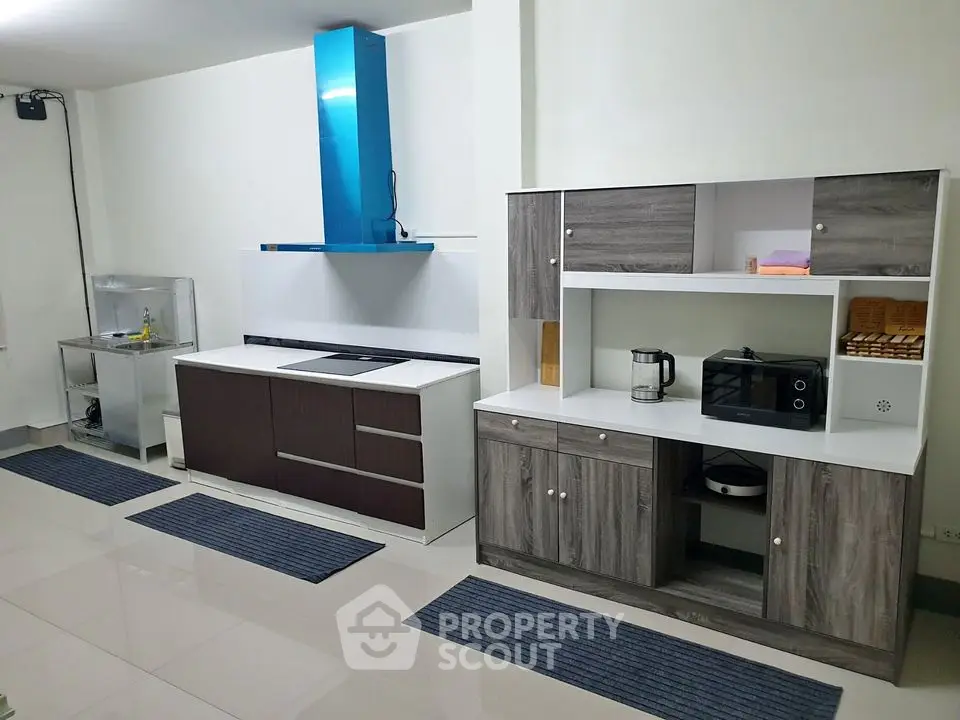 Modern kitchen with sleek cabinetry and stainless steel appliances