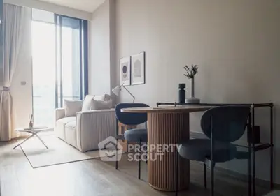 Modern living room with stylish furniture and natural light