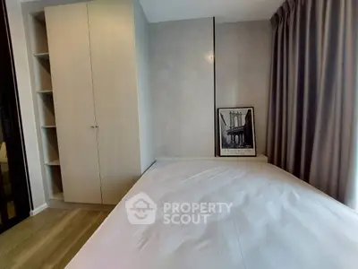 Modern bedroom with sleek wardrobe and stylish decor