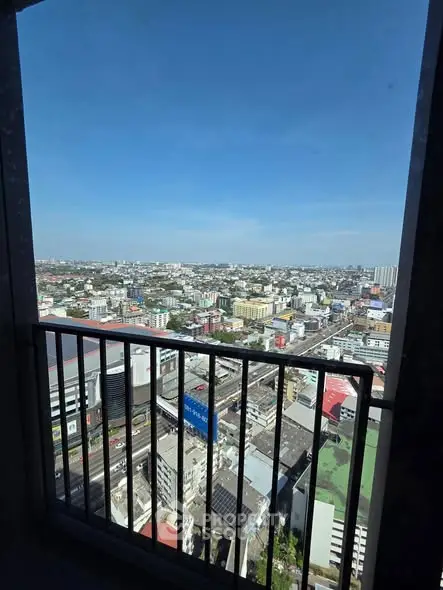 Stunning cityscape view from high-rise balcony, perfect for urban living.