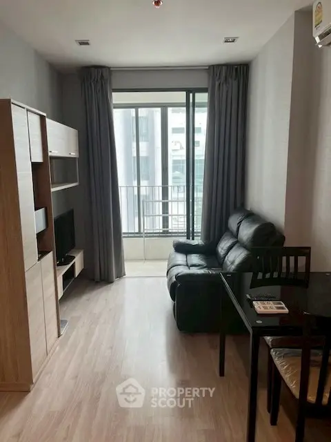 Modern living room with balcony view in a stylish apartment