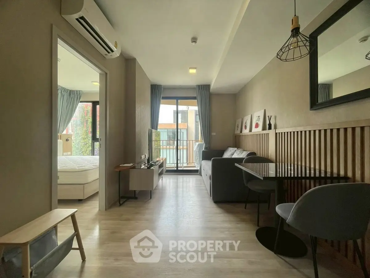 Modern apartment living room with balcony and stylish decor