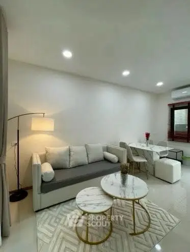 Modern living room with stylish furniture and elegant decor